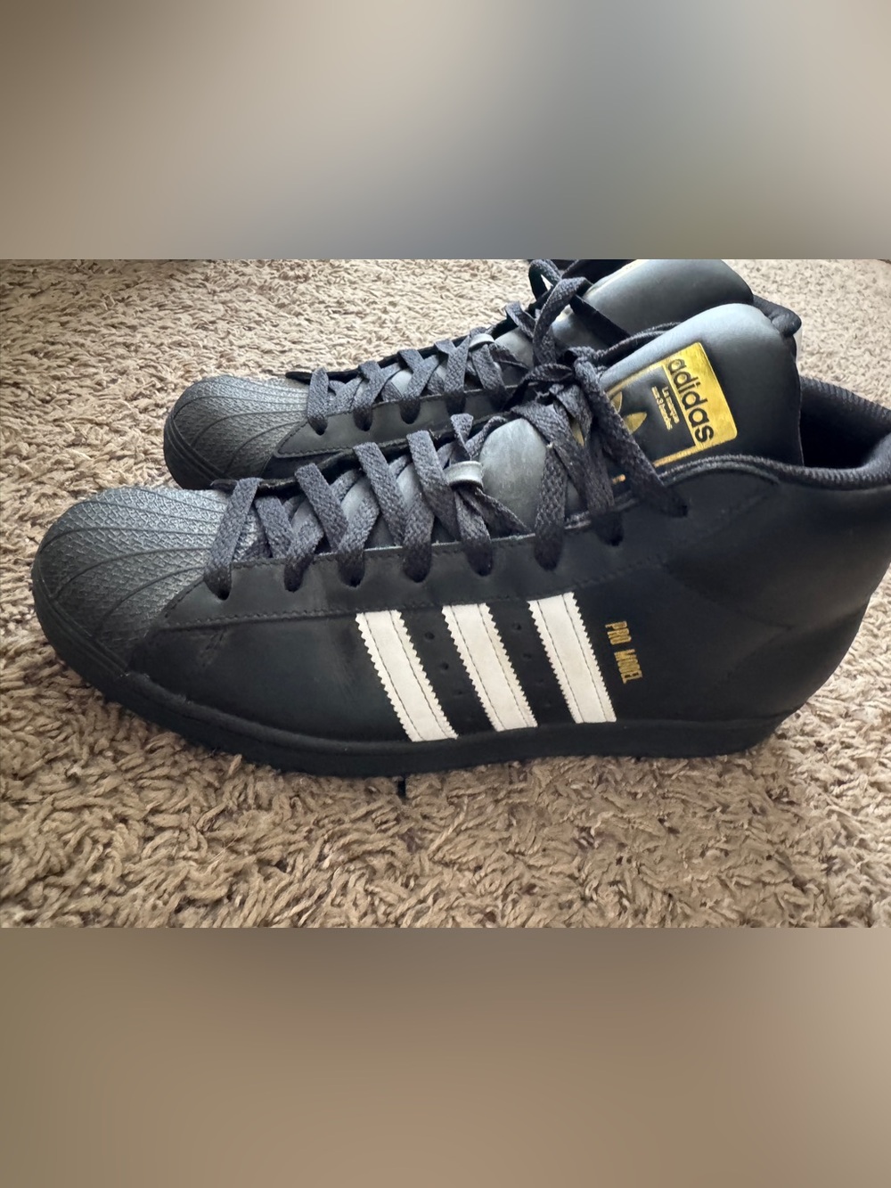 adidas Black and White Shell-Toe pro level Sneakers with Gold Logo